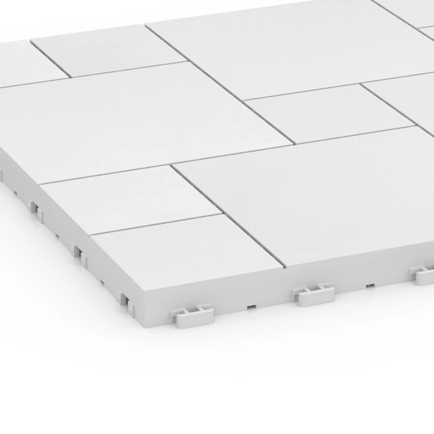 Detailaufnahme der Randausprägung von WARCO-Produkt 6333, Blokpatroon – Vlondertegel, Format 38,5 x 38,5 x 2 cm, Farbe Krijt.