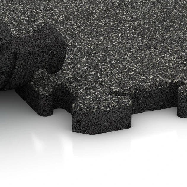 Großaufnahme vom Verbindungssystem von WARCO-Boden 4117 - Rubber sportvloer im Farbdesign Donkergrijs graniet. Abmessungen 500 x 500 x 40 mm.