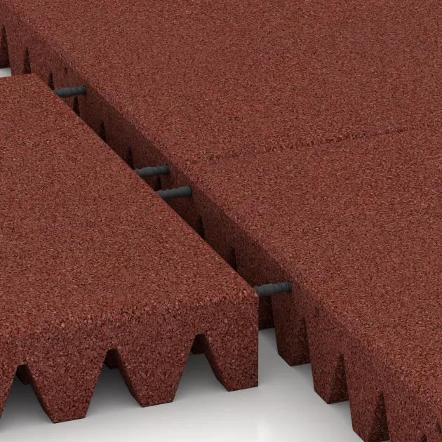 Großaufnahme vom Verbindungssystem von WARCO-Boden 5597 - Rubber speelplaatstegel 8 cm - EN 1177 ≤ 195 cm im Farbdesign Baksteenrood. Abmessungen 500 x 500 x 80 mm.