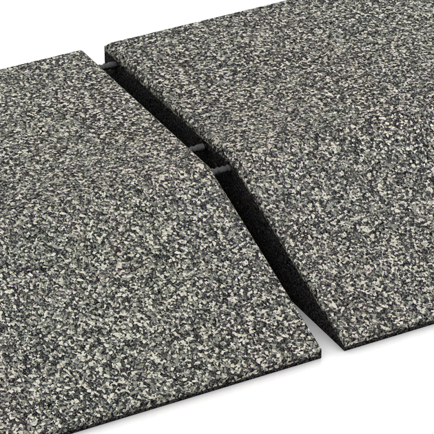 Großaufnahme vom Verbindungssystem von WARCO-Boden 3831 - Hoekpaneel (twee zijden afgeschuind) im Farbdesign Grijs Graniet. Abmessungen 500 x 500 x 100 mm.