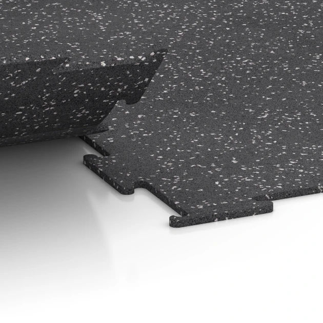 Großaufnahme vom Verbindungssystem von WARCO-Boden 6458 - Fitnessvloer Compact im Farbdesign Licht Grijs Gespeckeld. Abmessungen 50 × 50 × 0,8 cm.