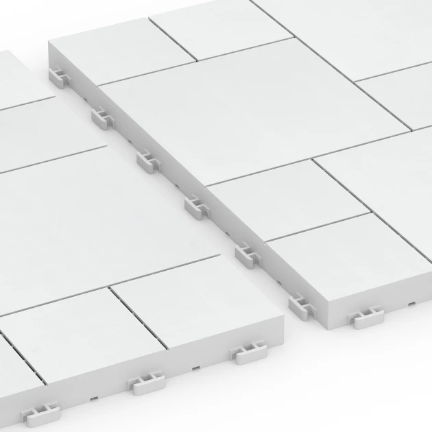 Großaufnahme vom Verbindungssystem von WARCO-Boden 6333 - Blokpatroon – Vlondertegel im Farbdesign Krijt. Abmessungen 38,5 x 38,5 x 2 cm.