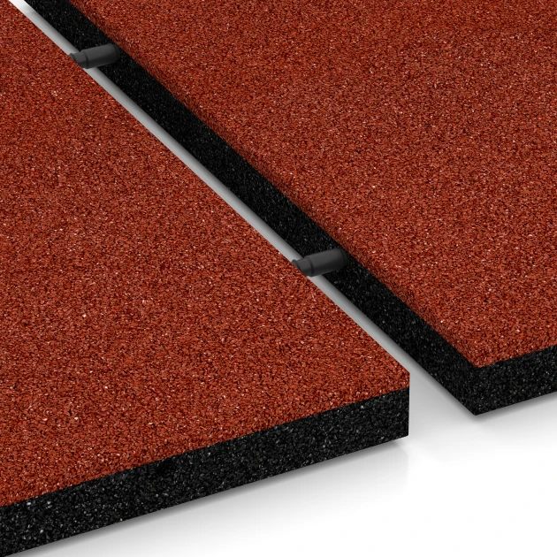 Großaufnahme vom Verbindungssystem von WARCO-Boden 6254 - Rubberen speelplaatstegel – 140 cm im Farbdesign Baksteenrood. Abmessungen 50 x 50 x 4 cm.