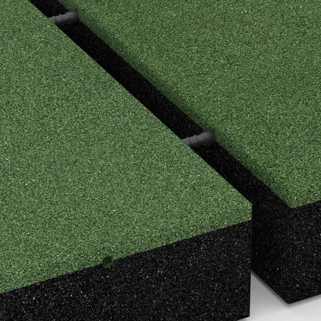 Großaufnahme vom Verbindungssystem von WARCO-Boden 6279 - Rubberen speelplaatstegel – 300 cm im Farbdesign Grasgroen. Abmessungen 50 x 50 x 11 cm.