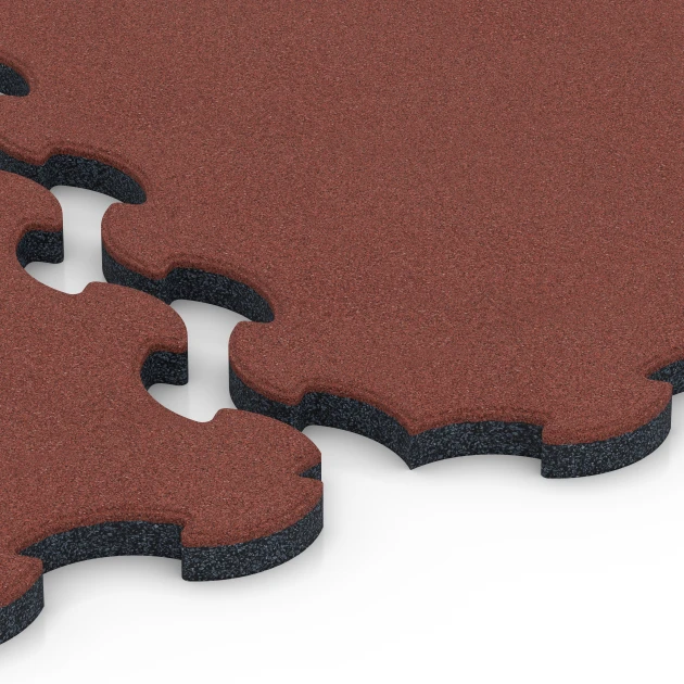 Großaufnahme vom Verbindungssystem von WARCO-Boden 6392 - Stallmatte Puzzle im Farbdesign Baksteenrood. Abmessungen 102,5 x 102,5 x 3 cm | 1,05 m².