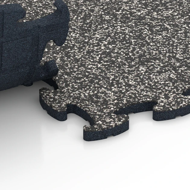 Großaufnahme vom Verbindungssystem von WARCO-Boden 6859 - Fitness Max vloersysteem im Farbdesign Donkergrijs graniet. Abmessungen 44,6 x 44,6 x 1,8 cm.