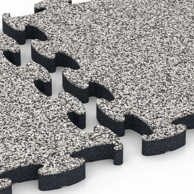 Großaufnahme vom Verbindungssystem von WARCO-Boden 6878 - Fitness Max vloersysteem im Farbdesign Grijs graniet. Abmessungen 44,6 x 44,6 × 2,8 cm.